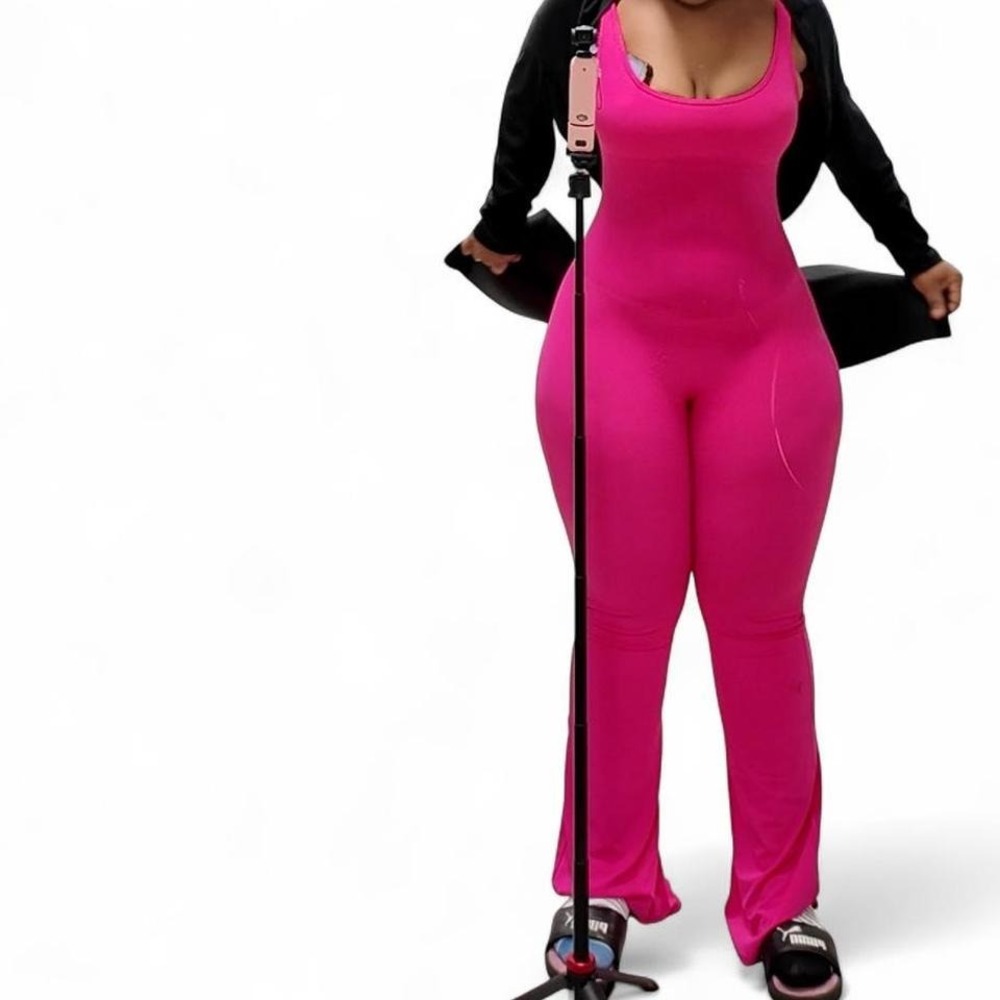 Pink flare jumpsuit with stretchy fabric